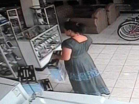 WATCH: Woman Steals Flat Screen Between Her Legs